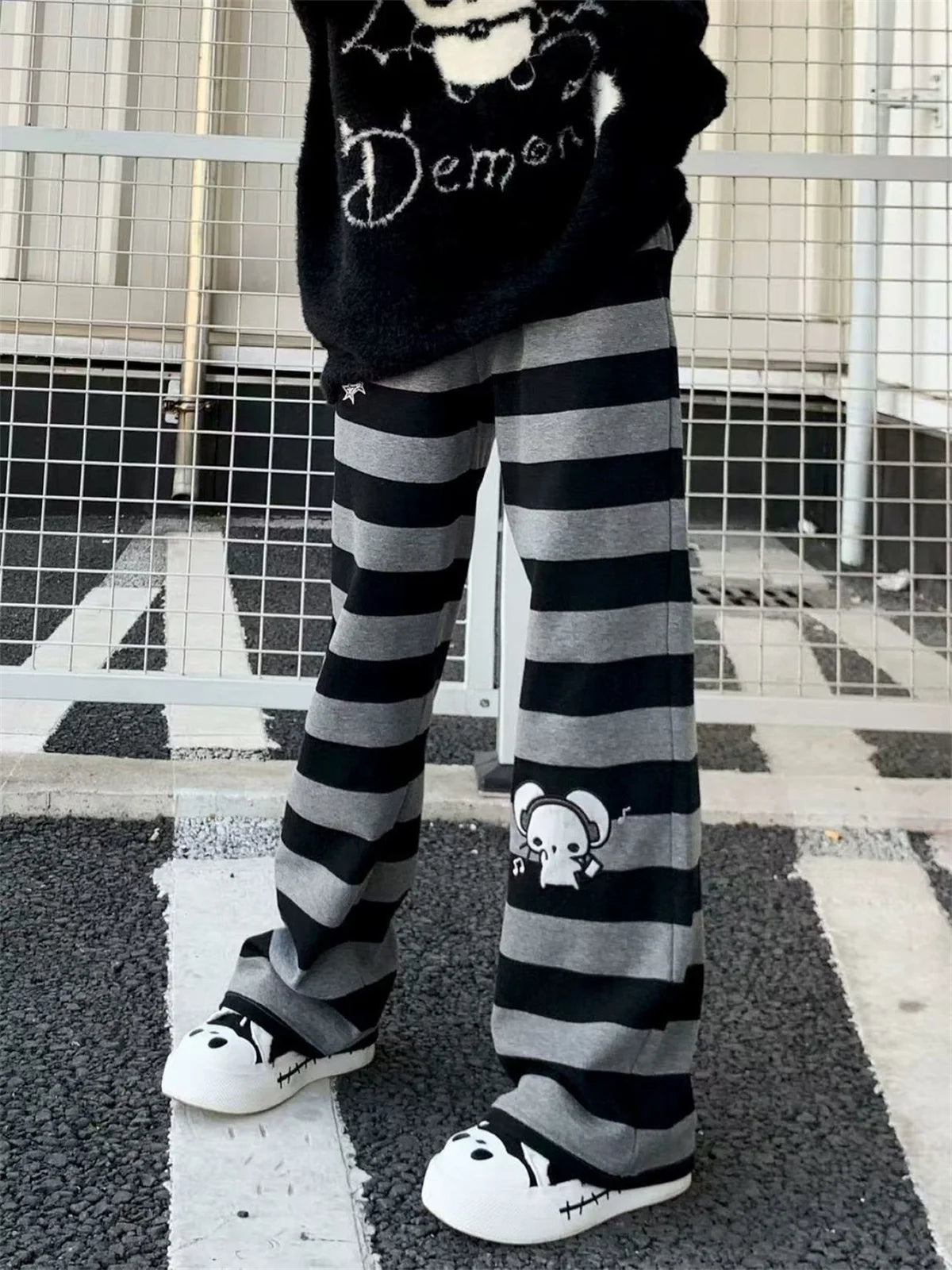Kawaii Black & Gray Striped Character Print Pants with Lace-Up Detail