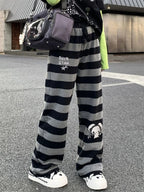 Kawaii Black & Gray Striped Character Print Pants with Lace-Up Detail