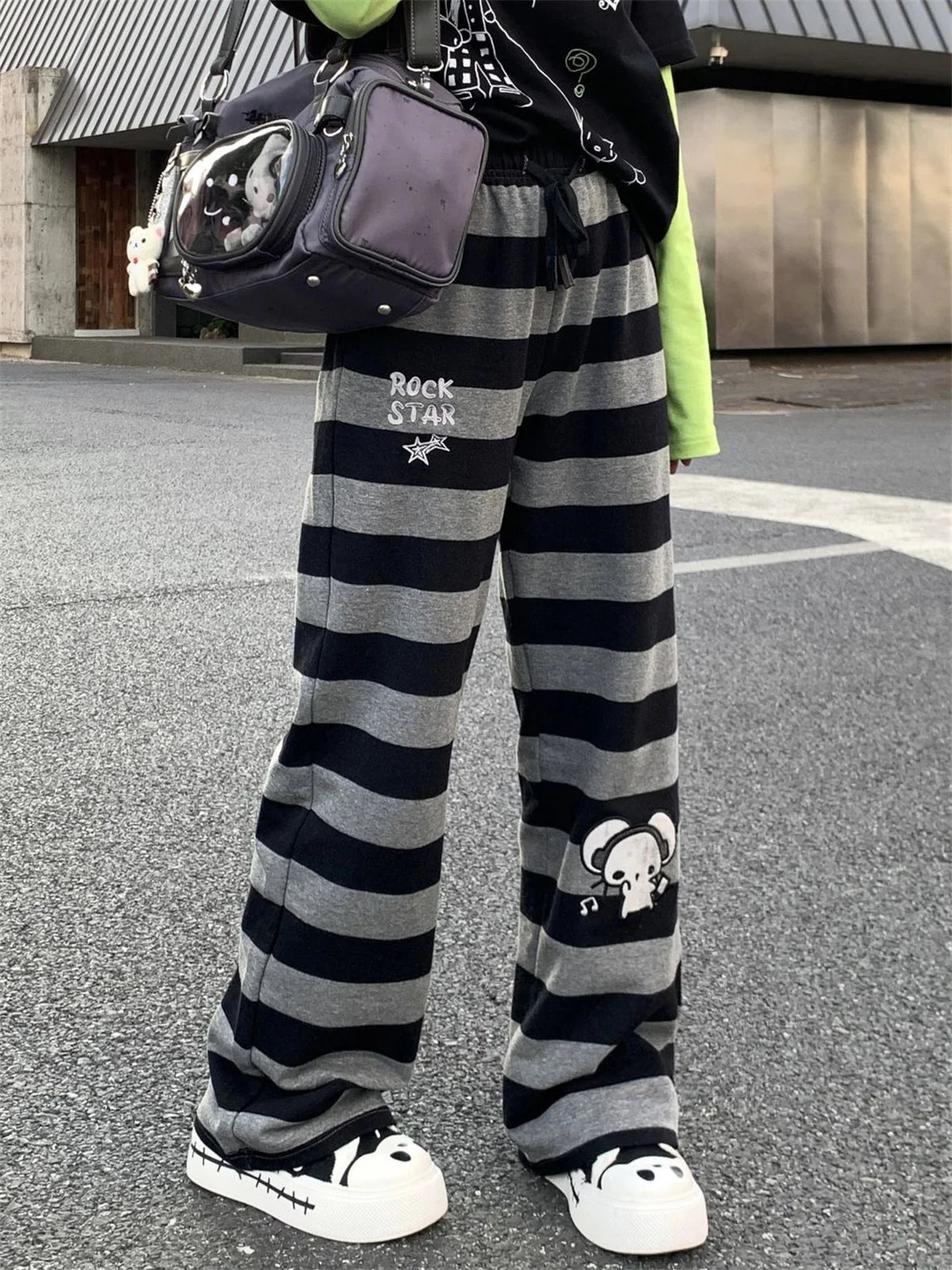 Kawaii Black & Gray Striped Character Print Pants with Lace-Up Detail