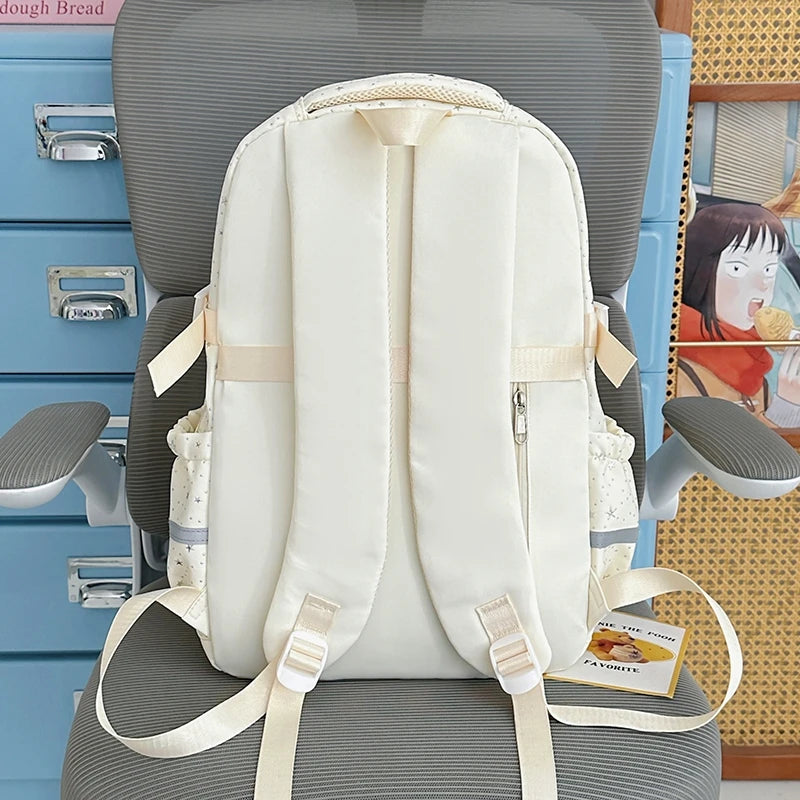 Kawaii Star-Print Multi-Pocket Backpack with Bow and Reflective Details