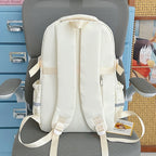 Kawaii Star-Print Multi-Pocket Backpack with Bow and Reflective Details