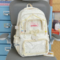 Kawaii Star-Print Multi-Pocket Backpack with Bow and Reflective Details